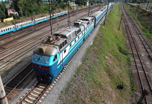 Passengers rush to land a suburban train in Ukraine