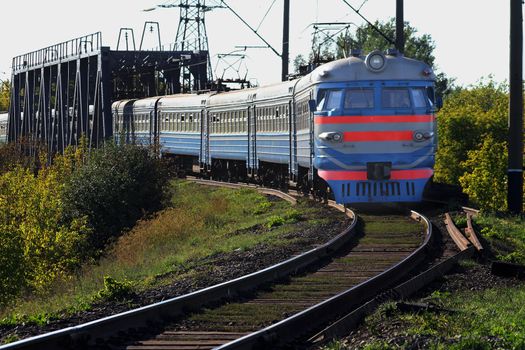 Passengers rush to land a suburban train in Ukraine