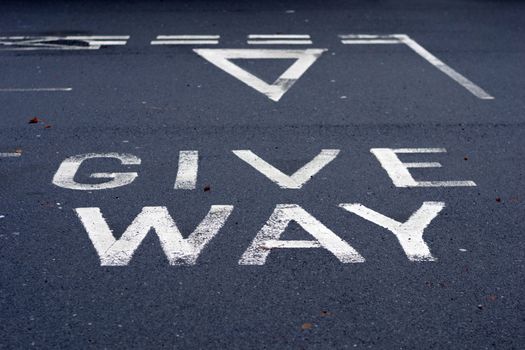 close up of give way sign on the road