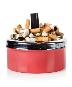 Cigarettes and old metal ashtray isolated on white background