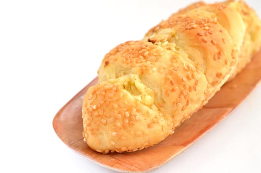 garlic bread with sesame on tray isolated, white background