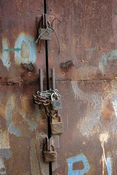 four old padlock to lock the door iron rusting