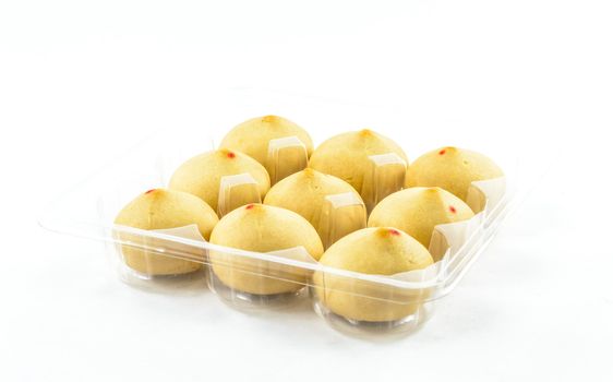 Mochi  cakes stacked on plastic tray,background isolated