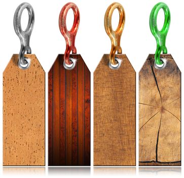 Four empty grunge wooden tags with metal ring on white background
