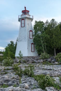 Big Tube Lighthouse in Tobermory Ontario was constructed in 1885. Played an important role guiding ships into the harbour from the waters of Lake Huron and Georgian Bay. The original structure was replaced by the six-sided, 14 meters wooden lighthouse that is seen today.