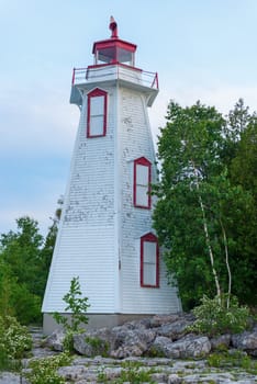 Big Tube Lighthouse in Tobermory Ontario was constructed in 1885. Played an important role guiding ships into the harbour from the waters of Lake Huron and Georgian Bay. The original structure was replaced by the six-sided, 14 meters wooden lighthouse that is seen today.