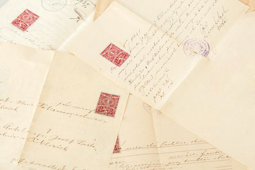 group of very old handwritten text agreements or contract