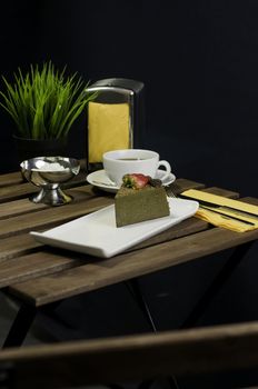 Coffee, cake, table set fork knife and flower