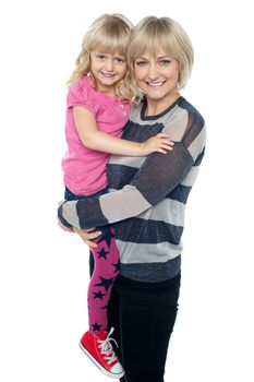 Cheerful mother carrying her cute daughter. All on white background.