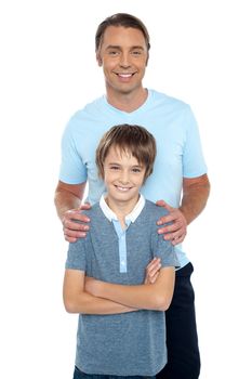 Middle aged father posing with his smart son, all against white background.