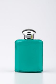 Turquoise green bottle of shampoo