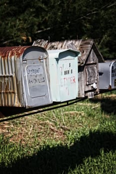 Old Rusty Metallic and Wooden Rural Mailboxes