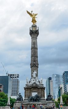 Mexico City's Independence Monument was built as part of the War of Independence centennial celebrations in 1910. The monument, often referred to as the Angel of Independence (El Ángel de la Independencia), is a 6.5-metre / 21-foot winged, shiny golden angel standing proudly at the top of the 36-metre / 118-foot column. 
