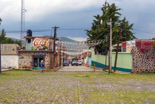 Oxtotipac across from church and monastery main street with shops and small businesses