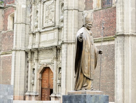 The Mexican artist-sculptor, Artemio Silva Arce of Tlalnepantla Edo did the approximately 20 foot bronze statue of Pope John Paul II which is seen in the plaza of Our Lady of Guadalupe Shrine at the base of Tepeyac hill in Mexico, immediately before the Basilica temple of the miraculous image.
 