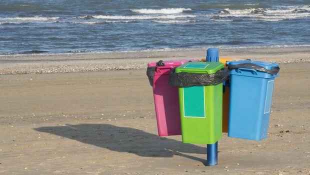 Garbage cans on the beach in Cervia in Italy