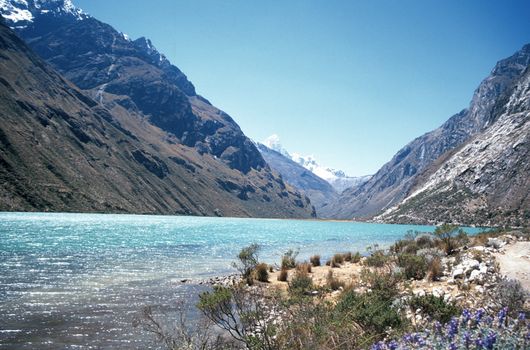 Stunning blue lake deep within the Andes Mountains in Peru