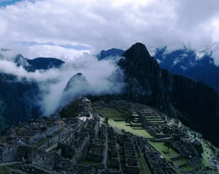 Stunning historic ruins of ancient lost Inca temple city Machu Picchu