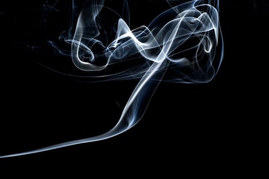 White smoke isolated on a black background