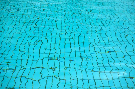 Blue ripped water in swimming pool