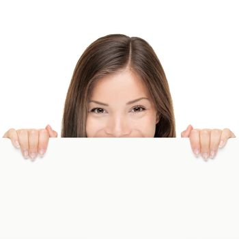 Billboard woman looking over sign isolated on white background. Mixed race Asian Caucasian female model looking.