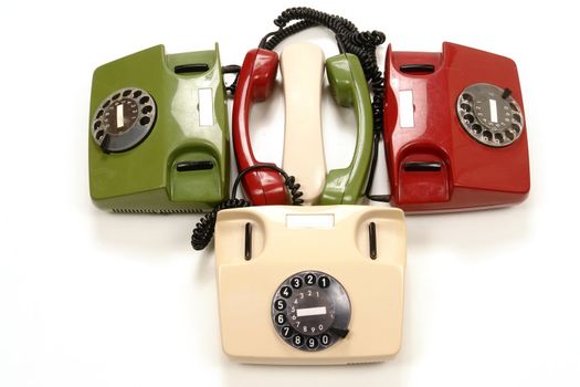 colourful retro phones symbolizing conference/teamwork/network.