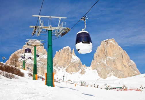 Monocable gondola lift at Val Di Fassa ski resort in Italy