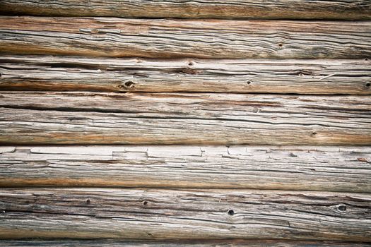 Weathered log house wall background