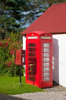 Iconic Red Lamp Box post box and telephone kiosk in Scotland