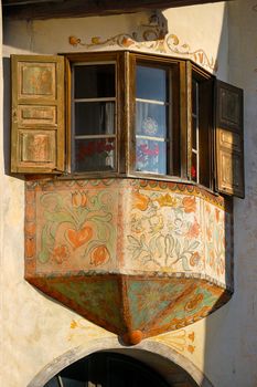 Detail of a typical window with decorations in Engadine - Switzerland