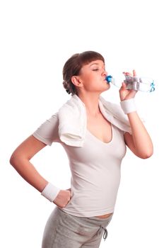 Portrait of young woman resting after sport, drink water