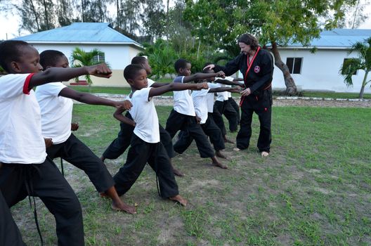 Malindi,Kenya- 16 October 2011:  a group of unidentified orphans learn martial arts discipline.The Italian Association Rizzato, follows the children in the discipline, Malindi October 16.2011