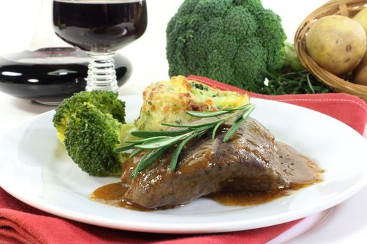 venison steak with broccoli and potatoes gratin