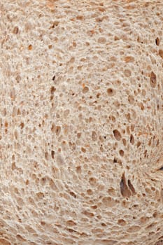 closeup of slice of light brown wheat bread