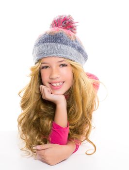 Kid girl with winter wool cap happy smiling on white background