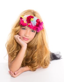 children fashion blond girl with spring flowers on head over white