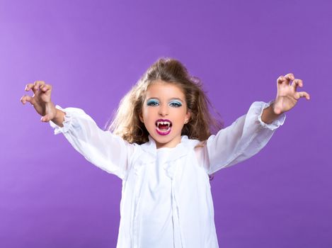 Children vampire makeup kid girl on purple background