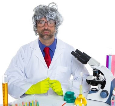 Nerd crazy scientist man portrait working at laboratory with gray hair