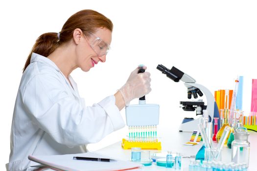 chemical laboratory scientist woman working with multi channel pipette