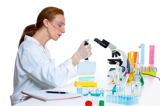 chemical laboratory scientist woman working with multi channel pipette