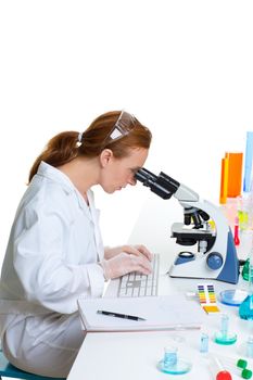 chemical laboratory scientist woman looking at microscope on white desk