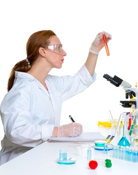 chemical laboratory scientist woman looking at test tube