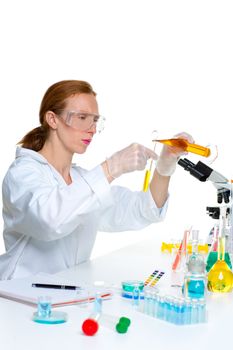 chemical laboratory scientist woman looking at test tube