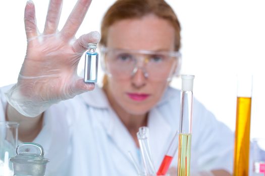 chemical laboratory scientist woman working with glass bottle