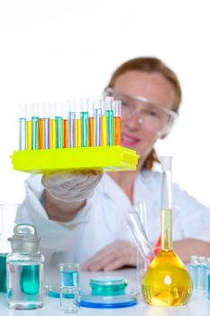 chemical laboratory scientist woman working with test tubes