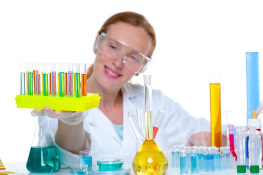chemical laboratory scientist woman looking at test tube