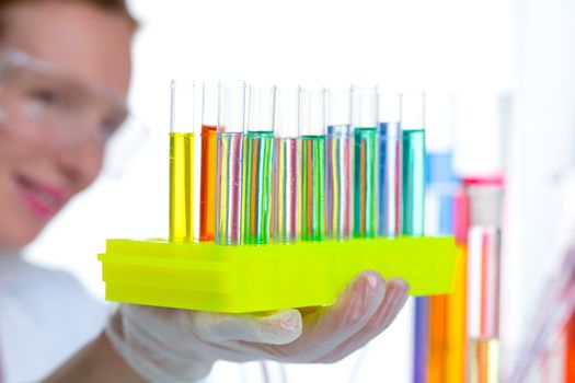 chemical laboratory scientist woman working with test tubes