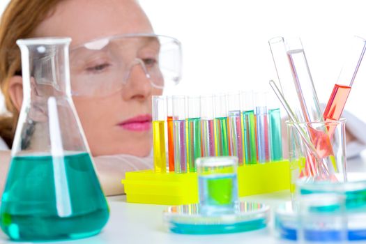 chemical laboratory scientist woman working with test tubes