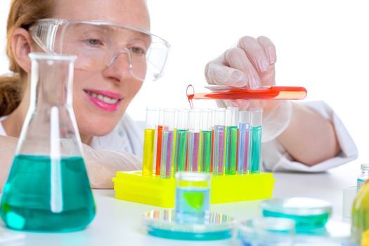 chemical laboratory scientist woman working with test tubes