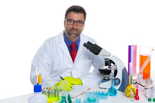 chemical laboratory scientist man working portrait on desk with microscope